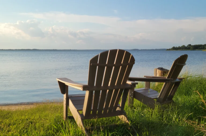 Centreville - adirondack chairs viewing the lake